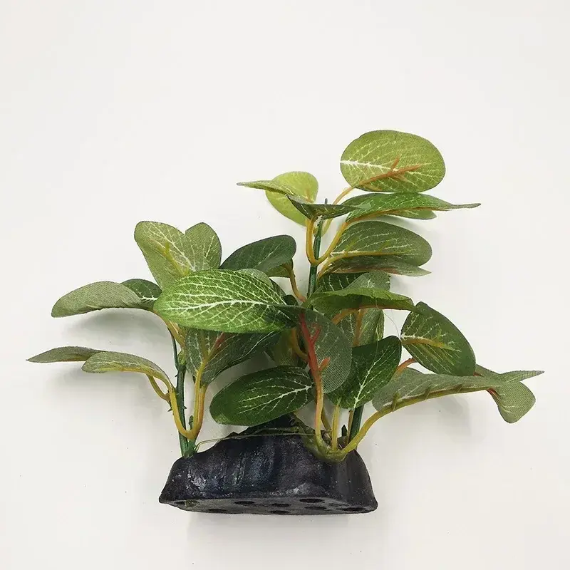 Plante artificielle pour aquarium verte en plastique, nervures blanches, base lestée.