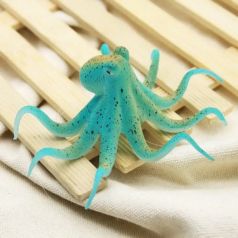 Deco silicone pieuvre aquarium bleu fluorescent 10x5cm, tenue en main avec ventouse et fils