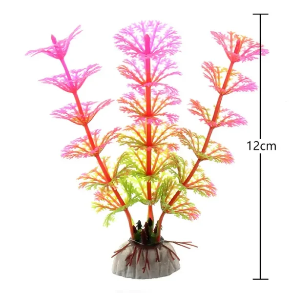 Plante artificielle pour aquarium couleurs fluo rose vert, base LDPE sur gravier.